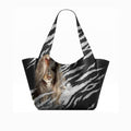 A black tote bag with a white zebra-stripe pattern and a printed portrait of a woman with long light brown hair on the front, shown against a plain white background. 