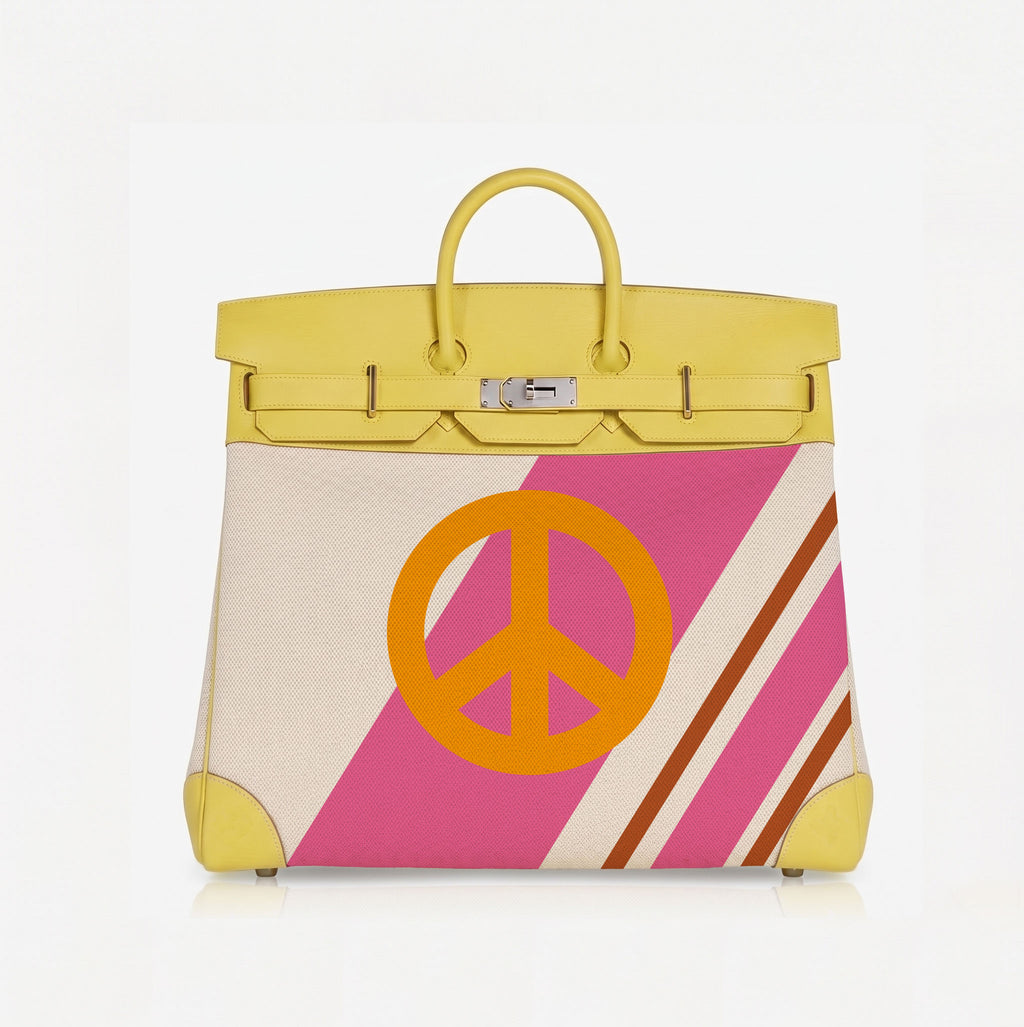 A structured yellow leather handbag with a front panel featuring a large orange peace sign over diagonal pink and cream stripes, shown on a clean white background.