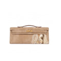 Crafted from luxurious beige calfskin suede, the Kali Long clutch pochette combines a soft, velvety texture. Designed with a refined top handle, slim closure straps, and polished gold-tone twist-lock hardware, with front gorgeous art print, interior is beige suede with inside pocket