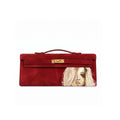 Crafted from luxurious red calfskin suede, the Kali Long clutch pochette combines a soft, velvety texture. Designed with a refined top handle, slim closure straps, and polished gold-tone twist-lock hardware, with front gorgeous art print