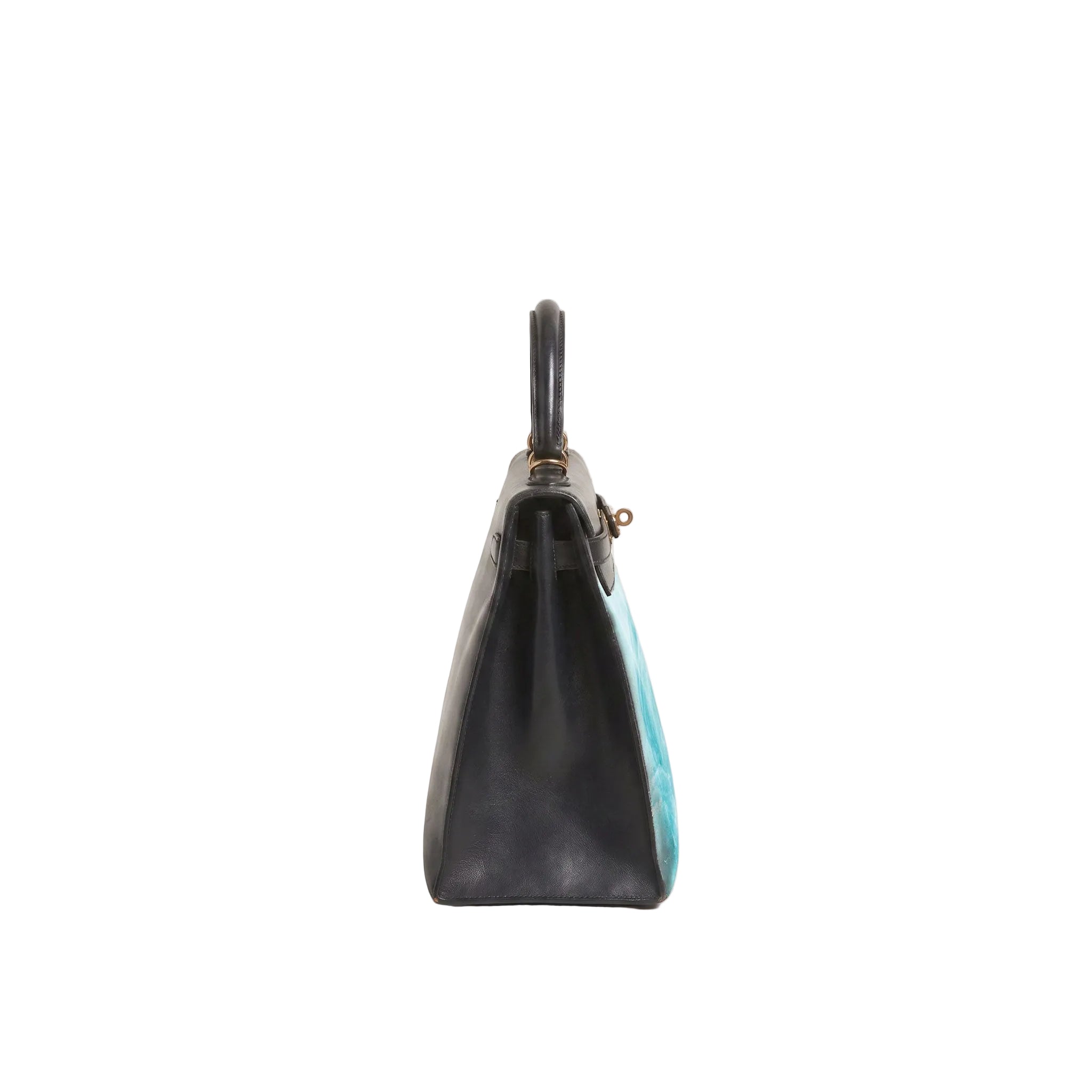 A structured leather handbag shown from the side profile against a plain light gray background. The bag is primarily black with a vibrant turquoise blue side panel and small gold-tone hardware.