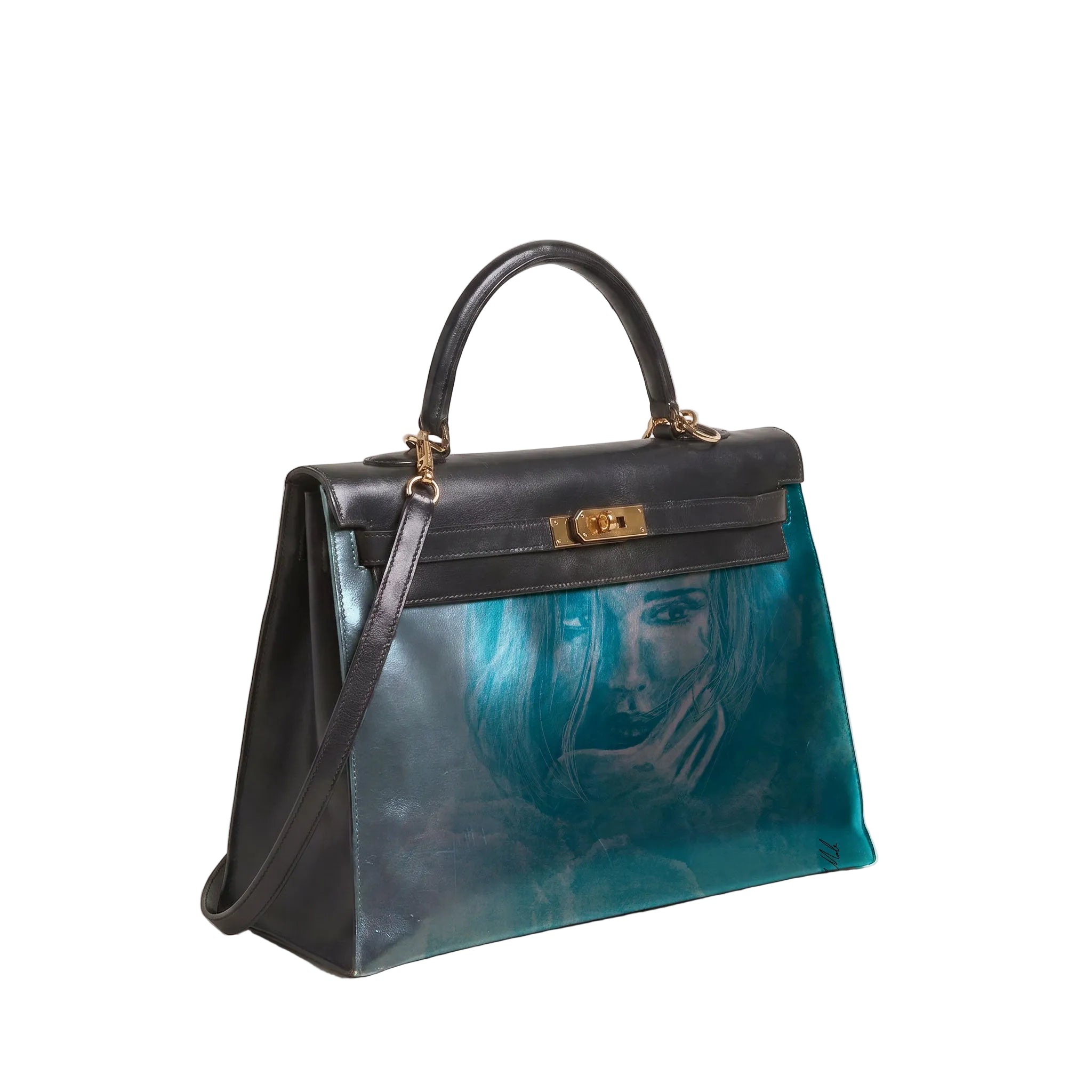 A structured handbag with a black leather top handle and flap, featuring a glossy teal-blue front panel printed with a portrait of a woman's face. The bag has gold-tone hardware and is photographed on a neutral light gray background.