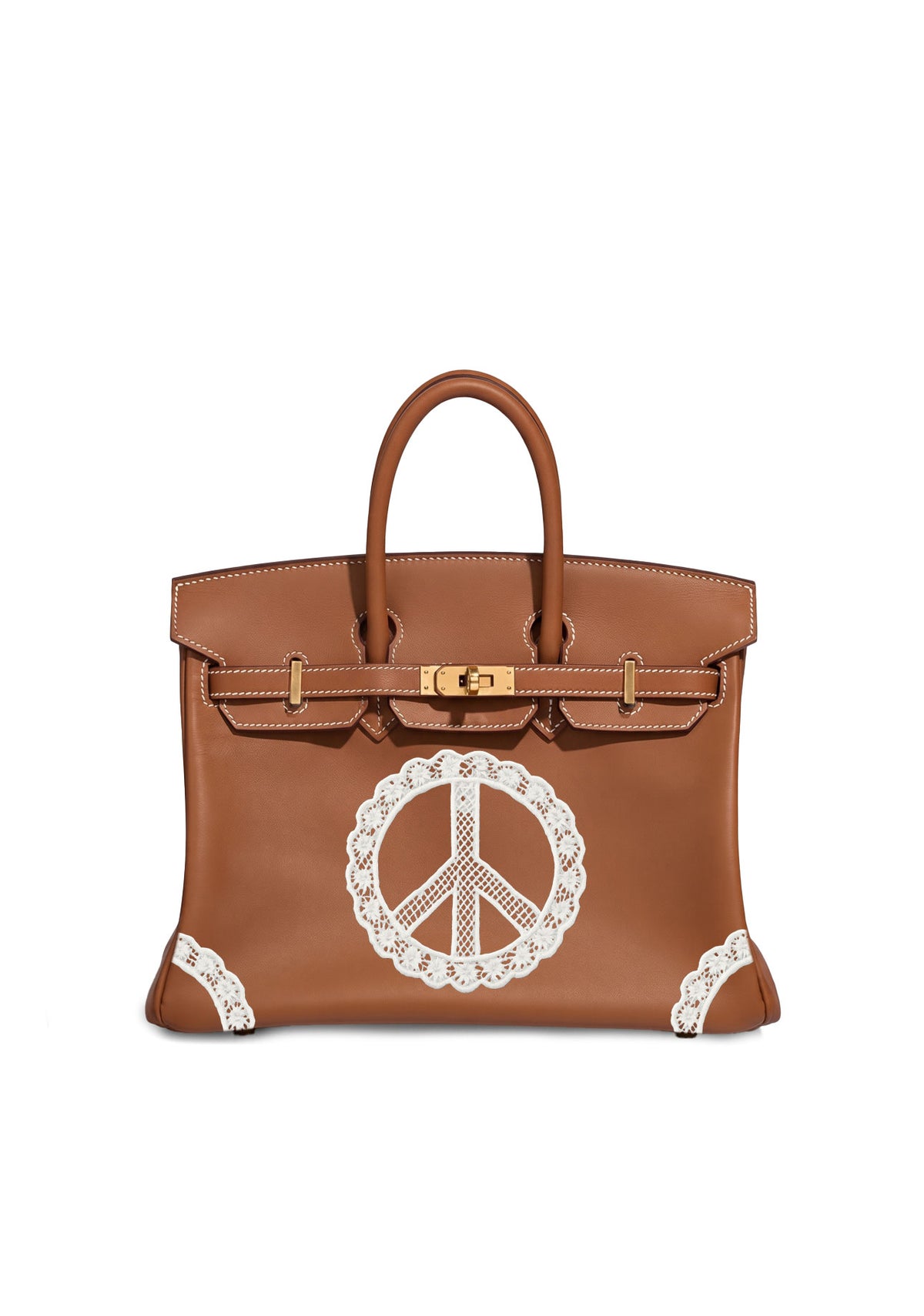 A brown leather handbag with gold-tone hardware and a large white lace peace sign appliqué on the front, shown against a plain white background.