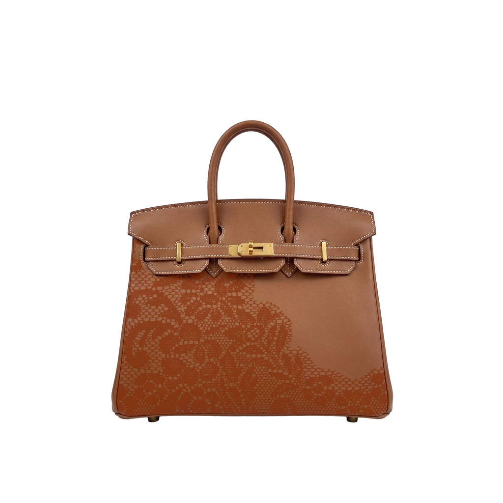 A brown leather handbag with a glossy embossed floral pattern on the lower front and gold-tone hardware, shown against a plain white background.