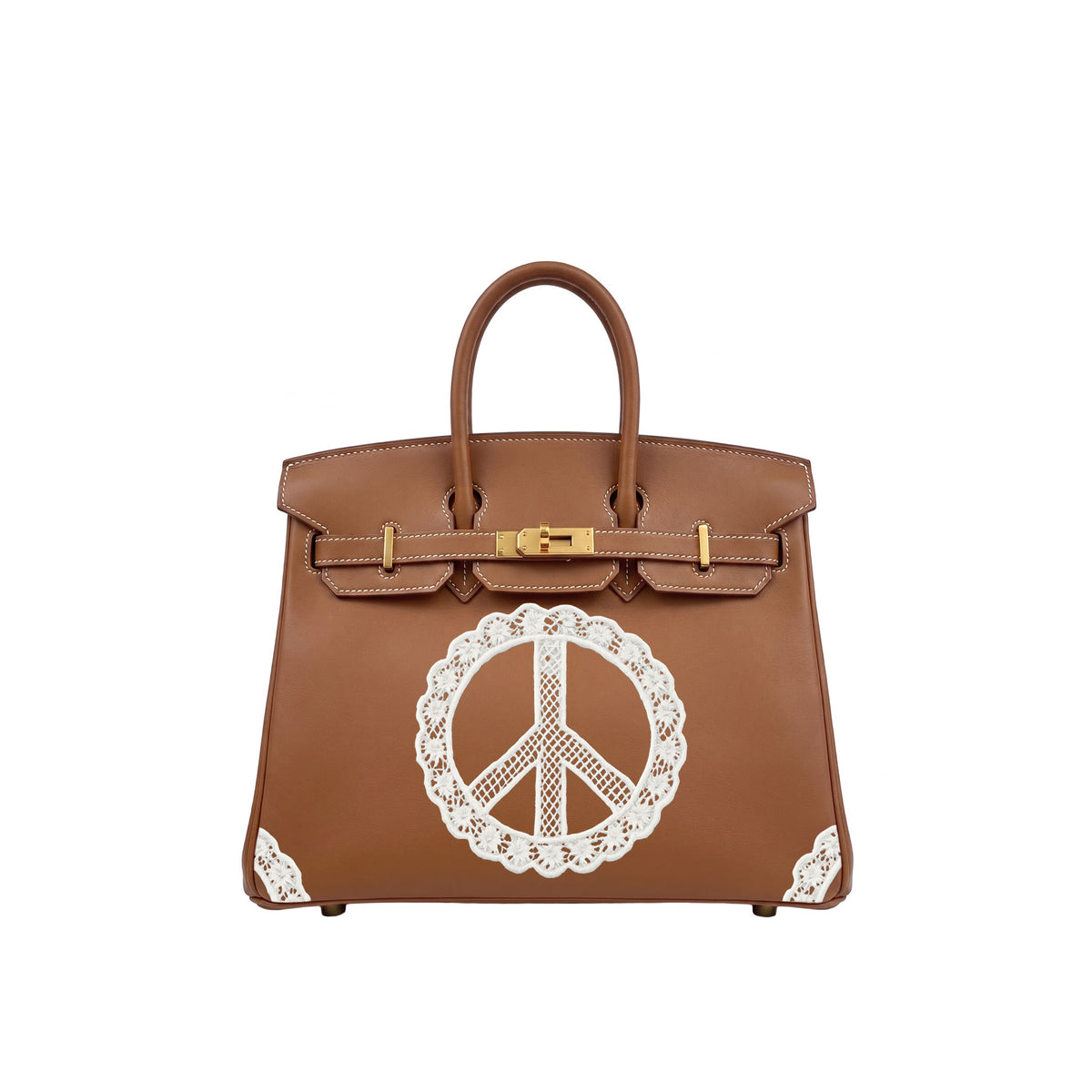 A brown leather handbag with gold-tone hardware and a large white lace peace sign applique on the front, shown against a plain white background.