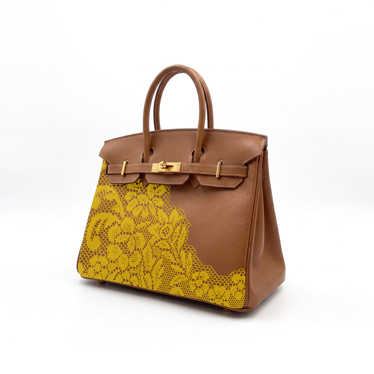 A structured brown leather handbag with a yellow print lace pattern on the front panel and gold-tone hardware, photographed on a clean white background.
