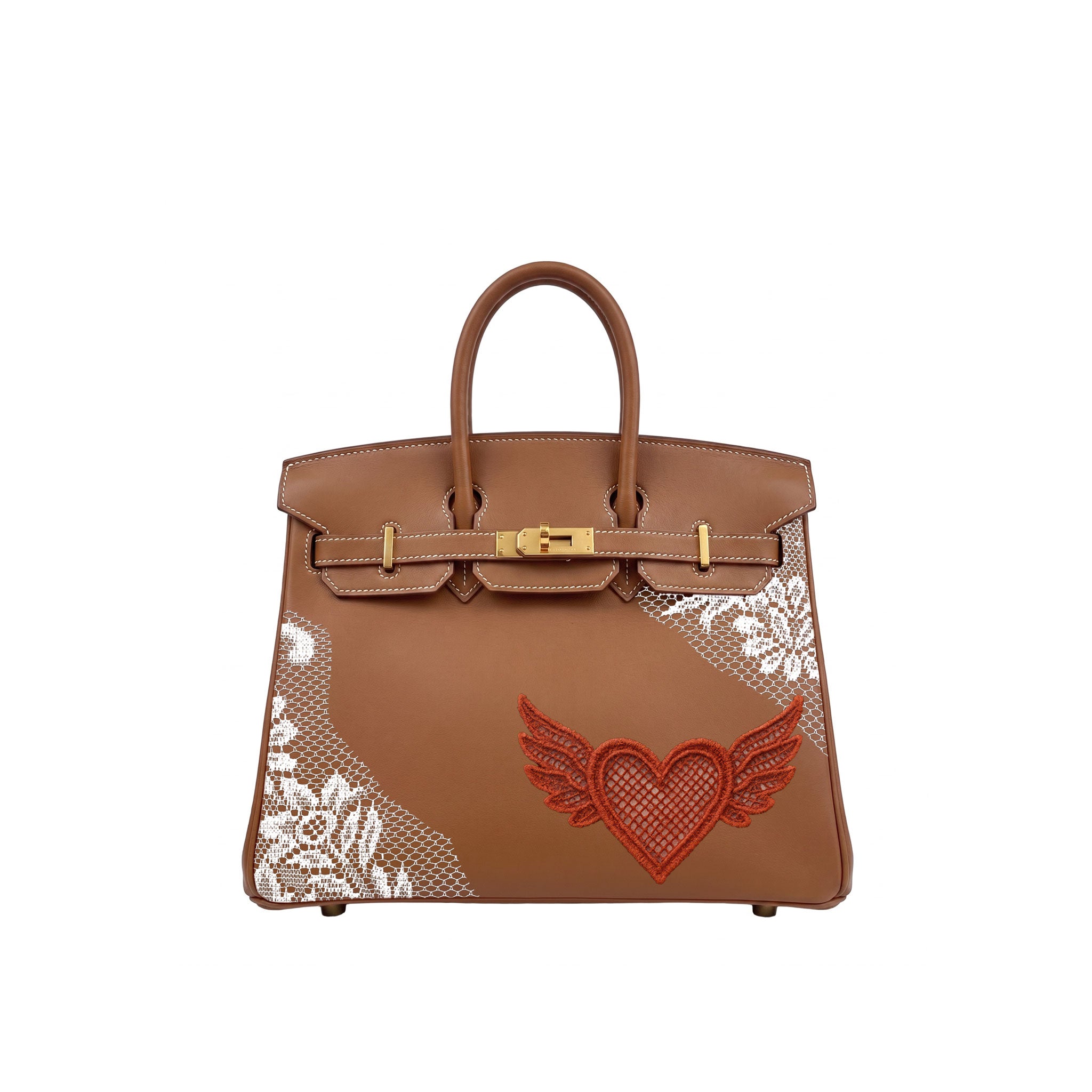 A brown leather handbag with gold-tone hardware, featuring a red embroidered winged heart on the front and white lace applique on the sides, shown against a plain white background.