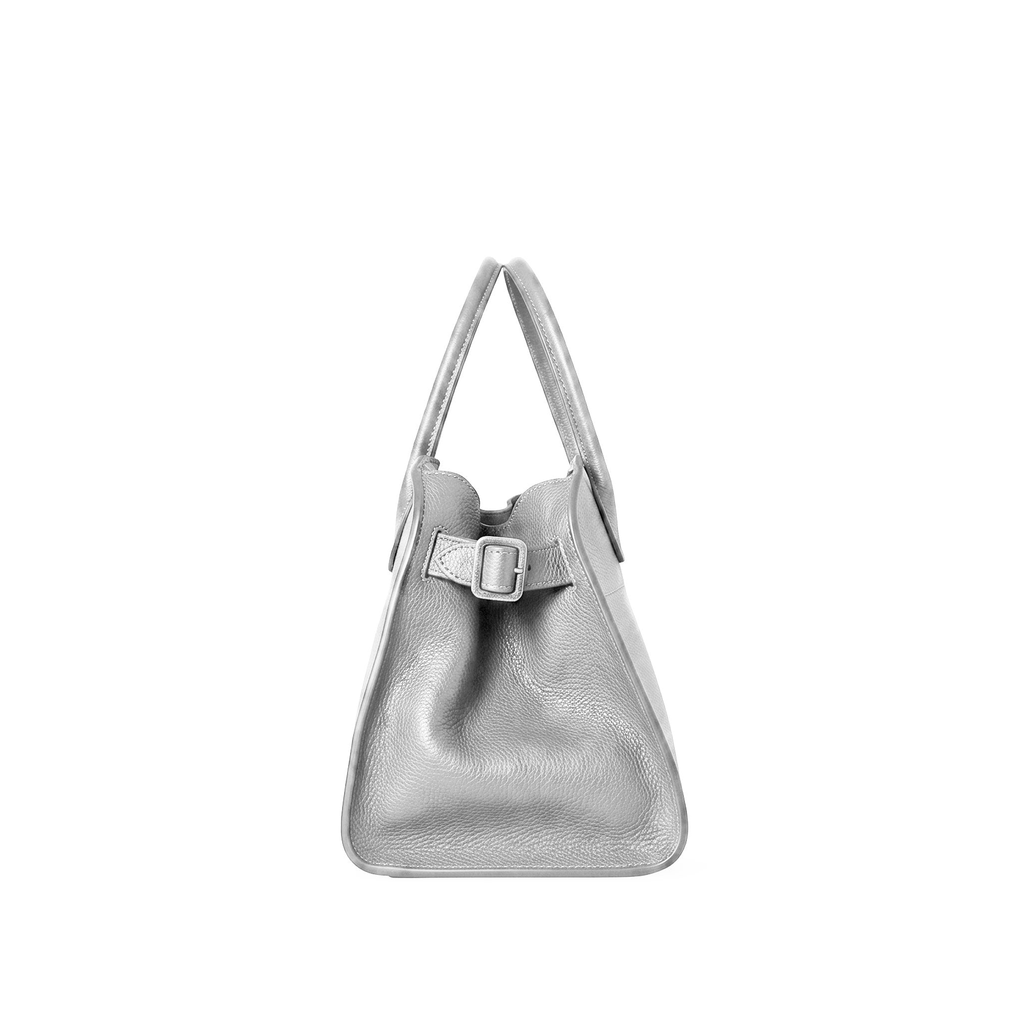 A metallic silver grained leather handbag with dual top handles and a decorative buckle strap detail on the front, shown against a plain white background.