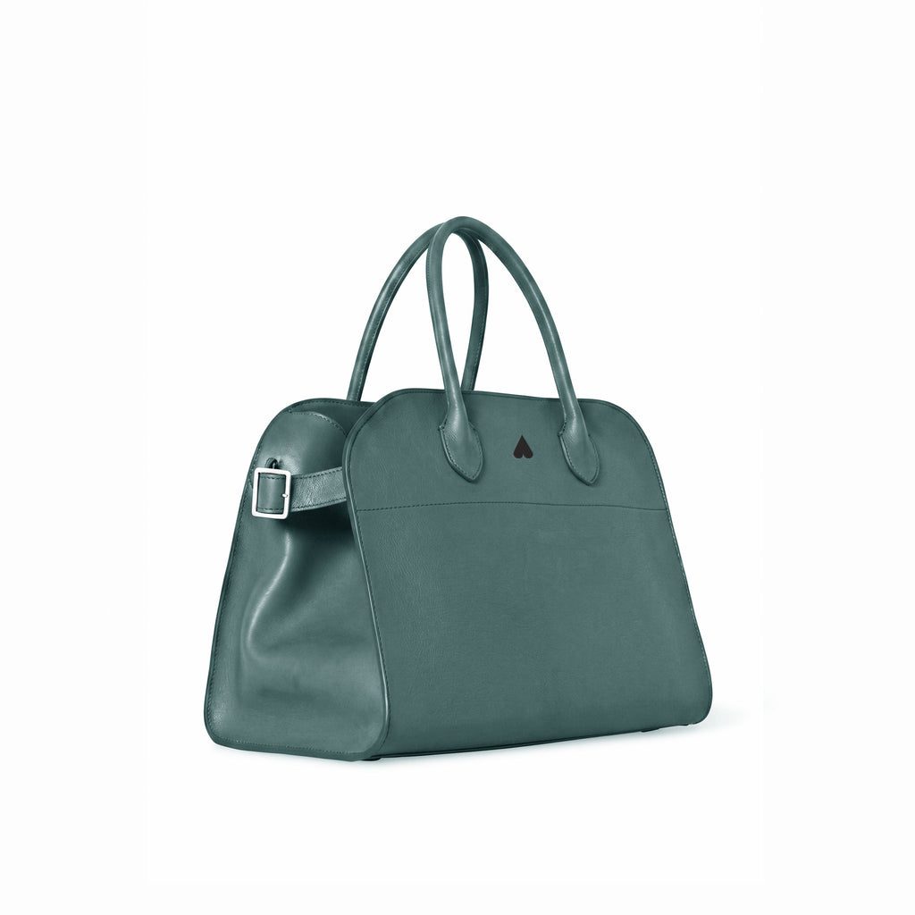 A dark teal green leather handbag with double top handles, a side buckle strap, and a small dark triangular logo on the front, shown on a plain white background.