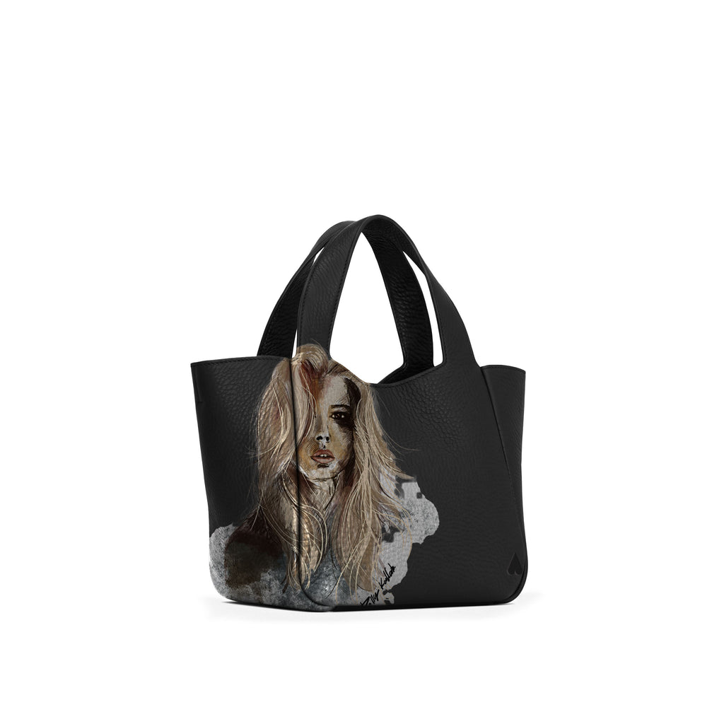 Eve Black Deerskin Leather Handbag is crafted from supple deerskin leather with a naturally grainy finish and distinguished by a gorgeous artistic front print