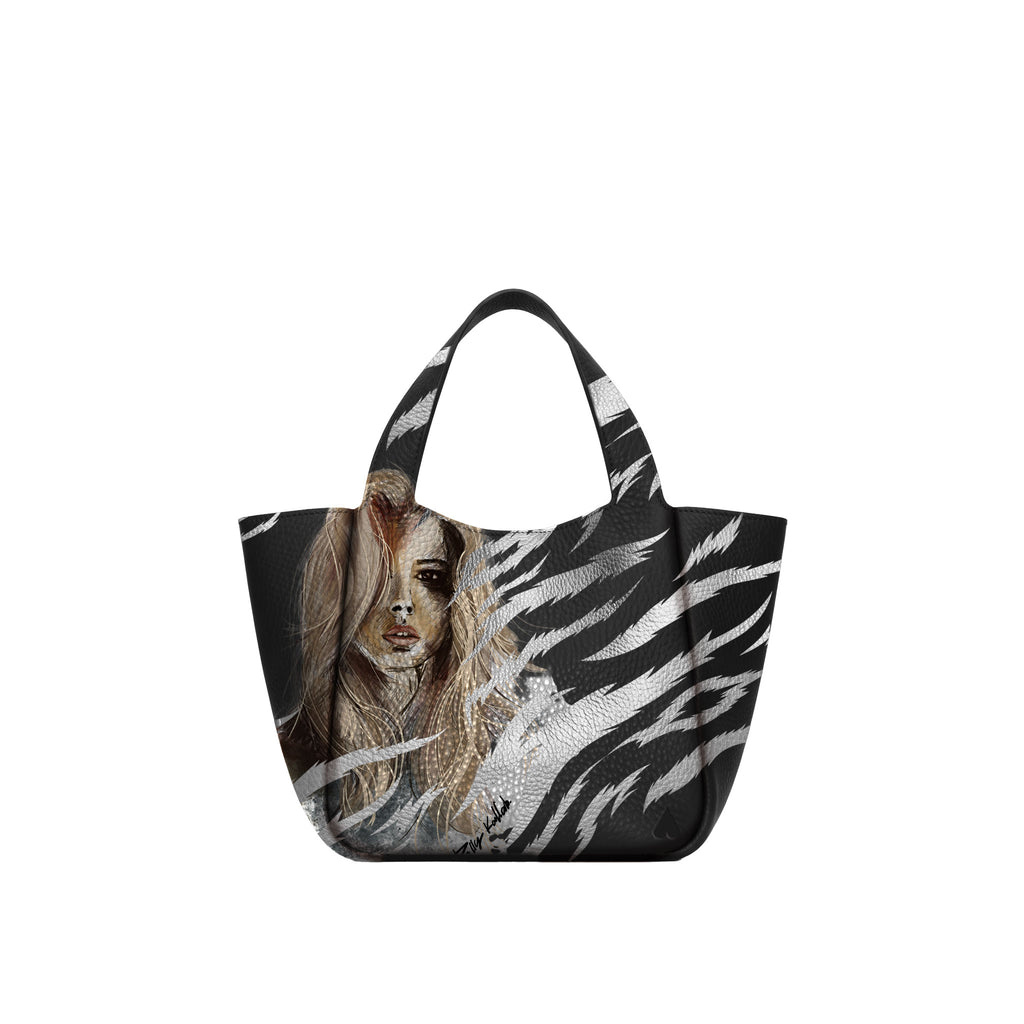 Eve Silver Zebra Handbag is crafted from supple deerskin leather with a naturally grainy finish and distinguished by a gorgeous artistic front print