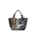 Eve Silver Zebra Handbag is crafted from supple deerskin leather with a naturally grainy finish and distinguished by a gorgeous artistic front print