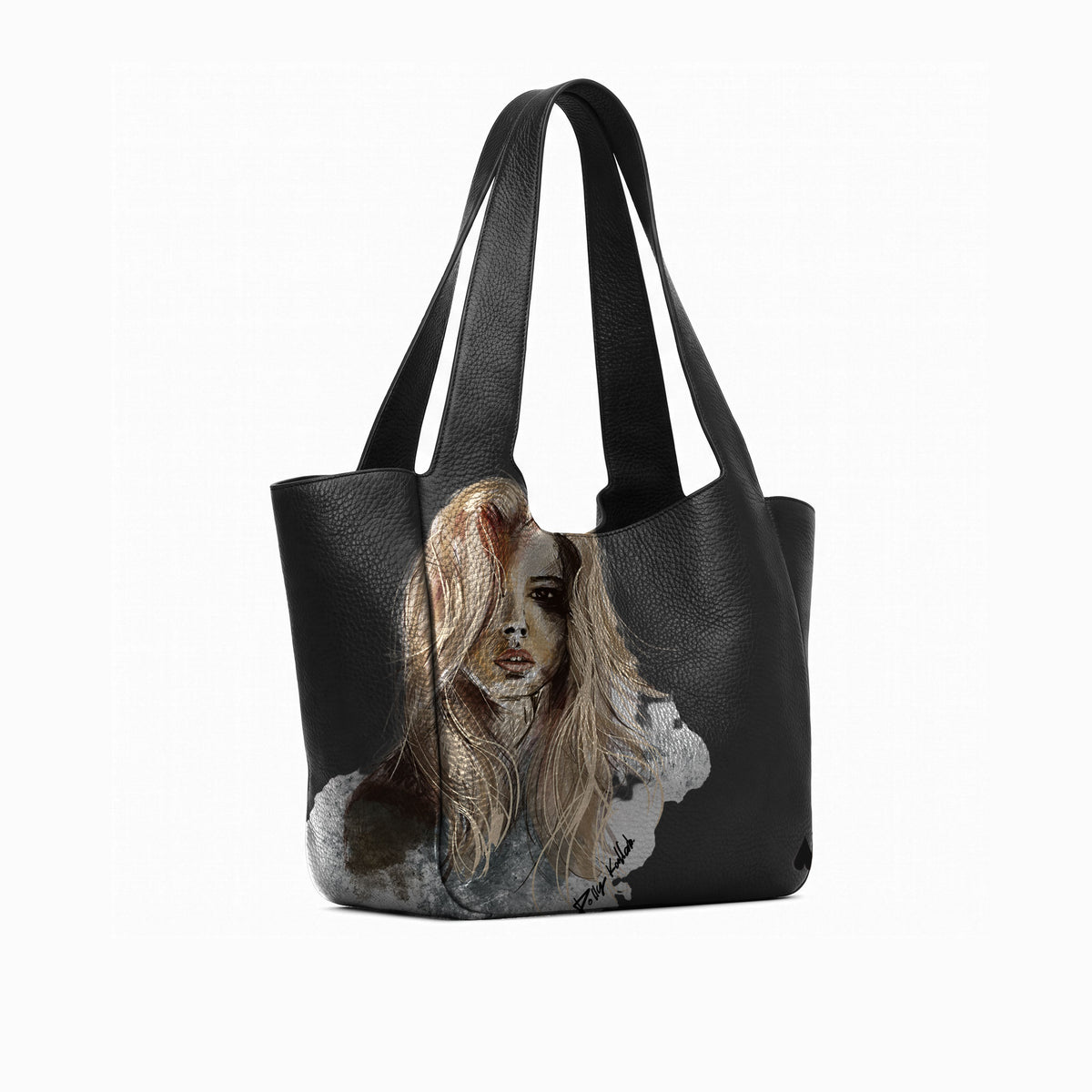 A black leather tote bag with a printed portrait of a woman on the lower front panel suede lining, shown on a white background.