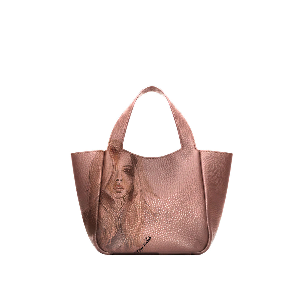 Eve Bronze Deerskin Leather Handbag is crafted from supple deerskin leather with a naturally grainy finish and distinguished by a gorgeous artistic front print