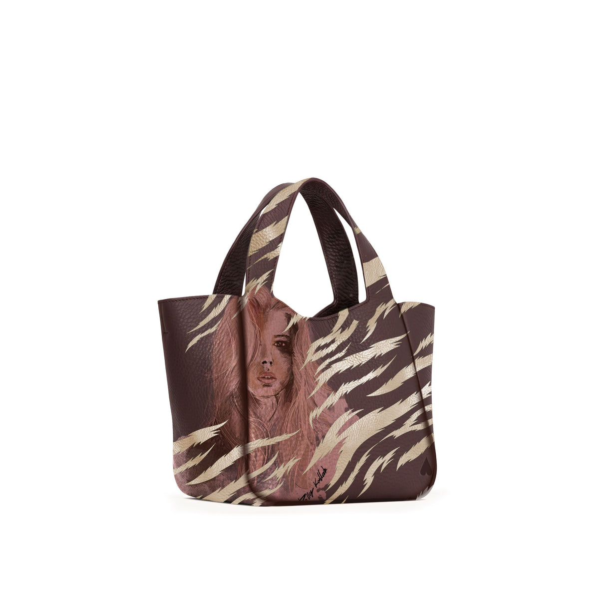 Eve Gold Zebra Handbag is crafted from supple deerskin leather with a naturally grainy finish and distinguished by a gorgeous artistic front print