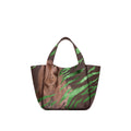 Eve Green Zebra Handbag is crafted from supple deerskin leather with a naturally grainy finish and distinguished by a gorgeous artistic front print