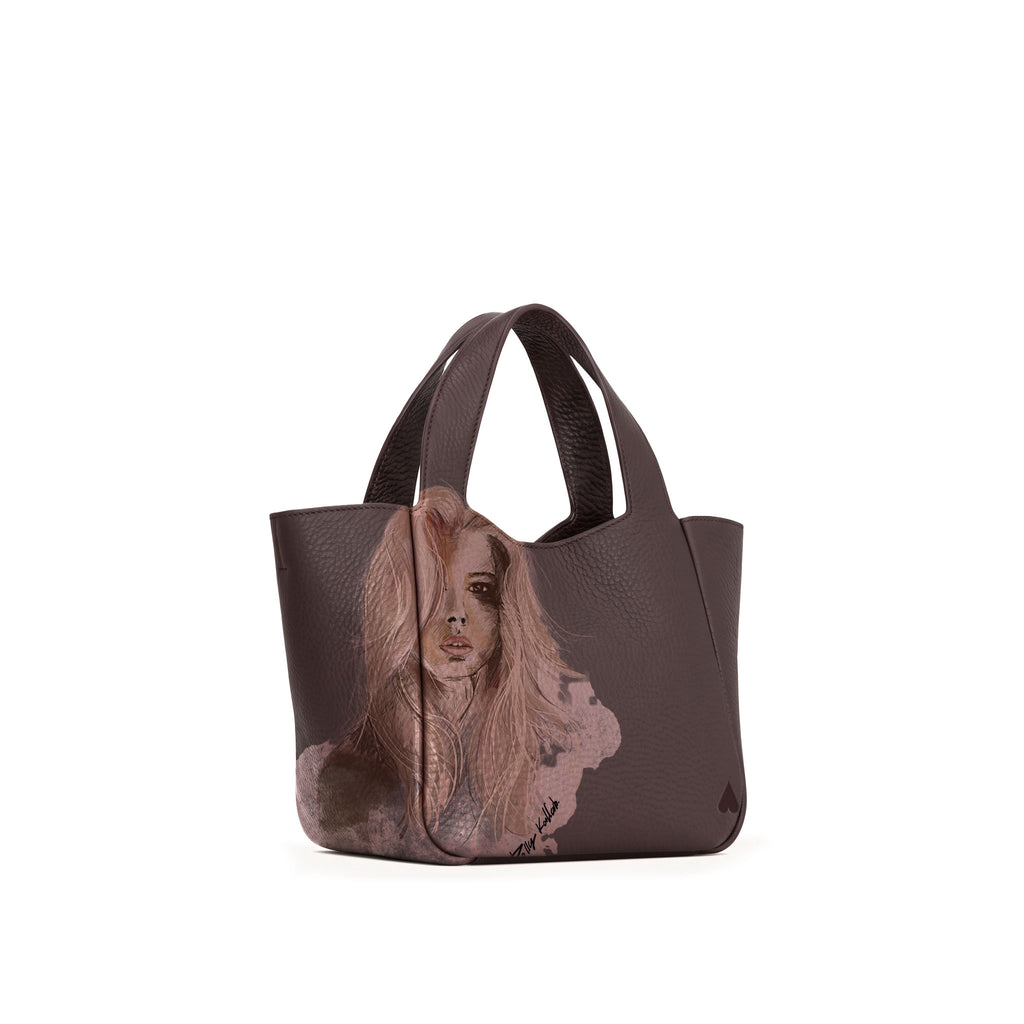 Eve Brown Deerskin Leather Handbag is crafted from supple deerskin leather with a naturally grainy finish and distinguished by a gorgeous artistic front print