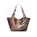 A dark brown leather tote bag with a printed illustration of a woman with long hair on the lower front panel, shown open against a white background.