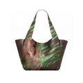 A dark brown leather tote bag with a printed illustration of a woman with long brown hair and green tiger print on the lower front panel, shown open against a white background.