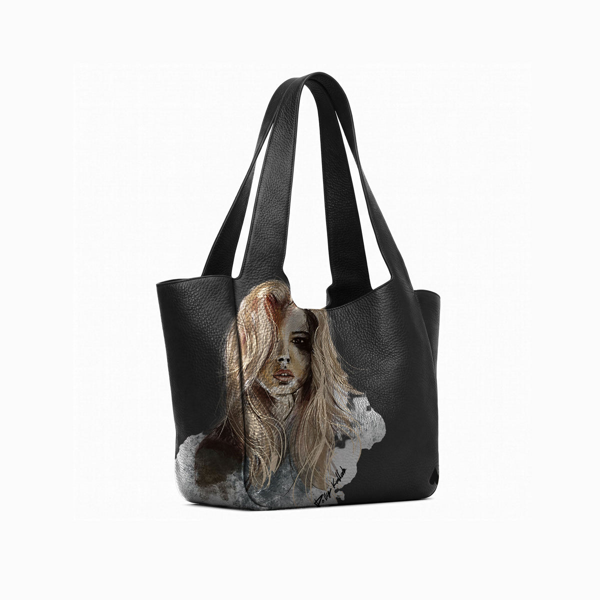 A black leather tote bag with a printed portrait of a woman on the lower front panel suede lining, shown on a white background.
